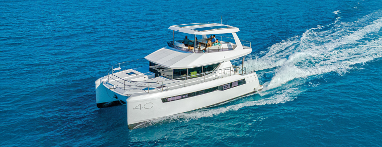 BULI luxury power catamaran cruising at speed on a boat charter in Phuket, Thailand