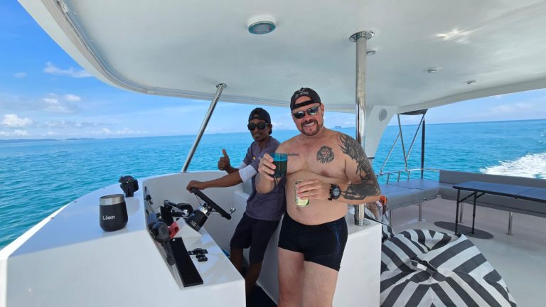 MUFASA luxury power catamaran anchored in Phang Nga Bay on a boat charter from Phuket