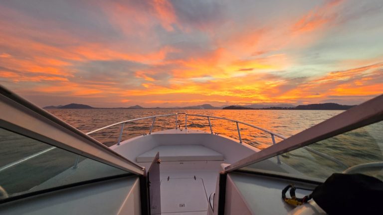 RAFIKI Sea Ray Express luxury speedboat cruising off Phuket on a charter in Thailand